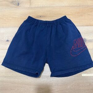 Nike Women's Navy Athletic Shorts with Red Logo